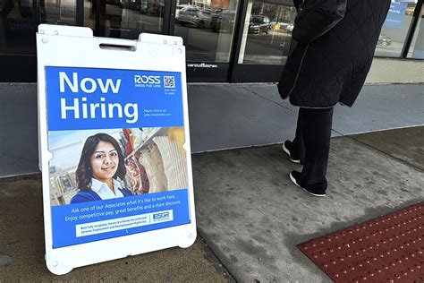 US applications for jobless benefits fall again as labor market continues to defy the Fed actions